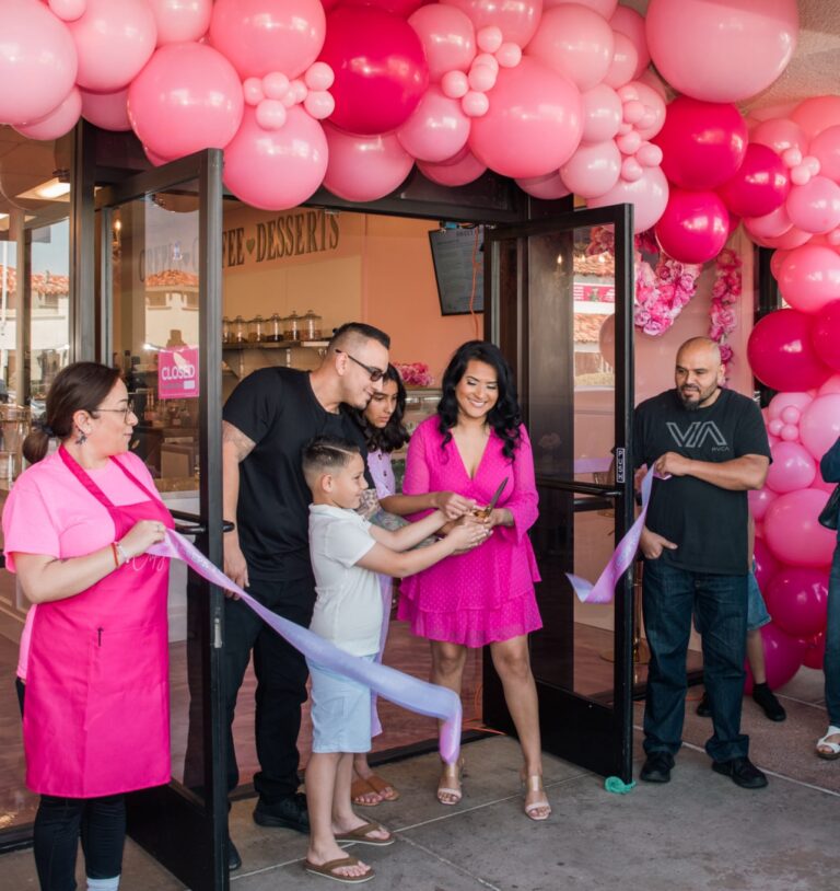 The P.S. I Crepe You family celebrating the grand opening ribbon cutting